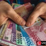 Rupiah Imbas Timur Tengah, Target Rp 17.050/USD